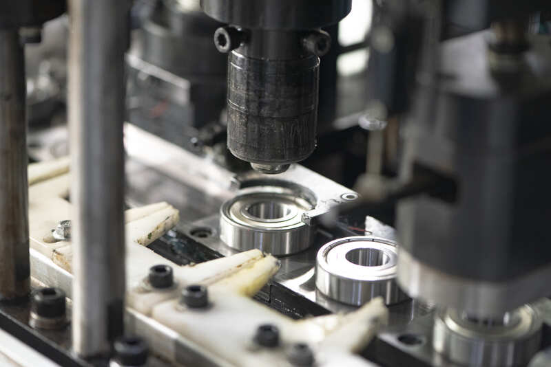 Take a roller-type component, common in industrial equipment. The traditional approach is to buy a standard bearing from